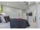 Bright main bedroom featuring a four-poster bed and neutral decor at 7222 E Gainey Ranch Rd # 245, Scottsdale, AZ 85258