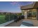 Relaxing patio offering views of a golf course, a dining table, and a cozy seating area at 7222 E Gainey Ranch Rd # 245, Scottsdale, AZ 85258