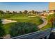 Scenic golf course view featuring lush green fairways and serene landscaping, as seen from the patio at 7222 E Gainey Ranch Rd # 245, Scottsdale, AZ 85258
