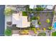 A captivating aerial view showcasing the home's layout, landscaping, pool, spa, and outdoor amenities at 7230 W Pershing Ave, Peoria, AZ 85381