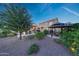 Outdoor oasis with gazebo, built-in grill, and lush landscaping perfect for entertaining at 7230 W Pershing Ave, Peoria, AZ 85381
