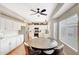 Open kitchen featuring a central island, stainless appliances, and adjacent dining space at 7230 W Pershing Ave, Peoria, AZ 85381
