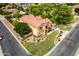Aerial view of a home with a well-maintained yard and appealing neighborhood at 7236 W Electra Ln, Peoria, AZ 85383