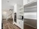 A kitchen with a stainless steel refrigerator, double oven, and bright white cabinets at 7236 W Electra Ln, Peoria, AZ 85383