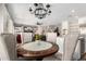 Well-lit living space with easy access to both kitchen and backyard pool area at 7236 W Electra Ln, Peoria, AZ 85383