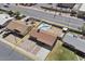 Aerial view of a single Gathering home featuring a backyard pool and generous lot at 724 N Pine St, Gilbert, AZ 85233