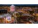 Aerial view of Gilbert, Arizona at night showcasing the city's water tower and downtown area at 724 N Pine St, Gilbert, AZ 85233