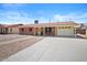 Charming single story home with a red brick facade, spacious driveway and covered porch area at 724 N Pine St, Gilbert, AZ 85233
