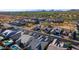An aerial view of a modern residential community that showcases a backyard pool and consistent desert landscaping at 8040 E Jaeger St, Mesa, AZ 85207