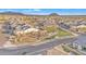 Aerial view of a Primary planned community park with lush green lawns and the mountains in the background at 8040 E Jaeger St, Mesa, AZ 85207