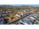 An aerial view of a residential community showcases the neatly planned streets and desert landscaping between the homes at 8040 E Jaeger St, Mesa, AZ 85207