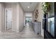 Open entryway with tile flooring and view of the open living room at 8040 E Jaeger St, Mesa, AZ 85207