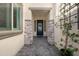 Close up on a front door with sidelights and stone accents at 8040 E Jaeger St, Mesa, AZ 85207