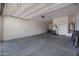 Bright and spacious two car garage showcasing ample storage and parking space, with easy access to the home at 8040 E Jaeger St, Mesa, AZ 85207