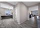 Open-concept living space with tile flooring, neutral walls, and a bright, airy feel at 8040 E Jaeger St, Mesa, AZ 85207