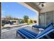 Spacious patio features comfortable seating, lush desert landscaping, and beautiful clear skies at 8040 E Jaeger St, Mesa, AZ 85207