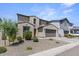 Charming two-story home featuring a two-car garage and low-maintenance landscaping at 9230 E Scott Ave, Mesa, AZ 85212