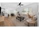 Bright living room showcases natural light, neutral tones, and seamlessly blends dining and lounging at 9230 E Scott Ave, Mesa, AZ 85212