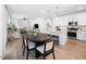 Open floor plan kitchen, dining area and living room, perfect for entertaining guests at 9230 E Scott Ave, Mesa, AZ 85212