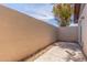 Private backyard enclosed by a block fence and featuring a concrete patio at 1047 W Laguna Dr, Tempe, AZ 85282