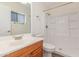 Bright bathroom featuring a walk-in shower, vanity and modern fixtures at 1047 W Laguna Dr, Tempe, AZ 85282