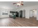 Spacious living area featuring laminate floors, modern appliances, and ample natural light at 1047 W Laguna Dr, Tempe, AZ 85282