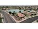 Picture perfect aerial view of a home featuring mature landscaping and excellent curb appeal in a quiet neighborhood at 11101 W Wilshire Dr, Avondale, AZ 85392