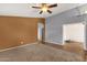 Neutral walls and tile floor in a multi-purpose living space provides opportunity for customization at 11101 W Wilshire Dr, Avondale, AZ 85392