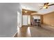 Open living room showing tile floors and walls of neutral colors creating a bright and airy space at 11101 W Wilshire Dr, Avondale, AZ 85392