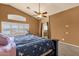 Vaulted main bedroom featuring neutral walls and carpeted flooring at 11101 W Wilshire Dr, Avondale, AZ 85392