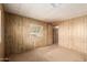 This bedroom is bright with a window and features neutral walls and carpet, ready for personalization at 11411 N 91St Ave # 28, Peoria, AZ 85345