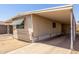 Exterior view of a single-story home with a covered carport at 11411 N 91St Ave # 28, Peoria, AZ 85345
