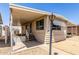 Front exterior of a single-story home with a covered entry and gravel landscaping at 11411 N 91St Ave # 28, Peoria, AZ 85345