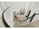 Elegant foyer with a winding staircase offering an airy view of the modern living space at 1285 E Horseshoe Ave, Gilbert, AZ 85296