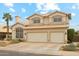 Charming two-story home with a spacious two-car garage, desert landscaping, and a tile roof at 1285 E Horseshoe Ave, Gilbert, AZ 85296