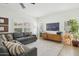 Comfortable living room with neutral tones, sectional sofa, and modern décor providing a relaxing space at 1285 E Horseshoe Ave, Gilbert, AZ 85296