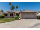 Attractive single-story home with an attached two-car garage and tiled roof at 1343 W San Carlos Pl, Chandler, AZ 85248