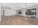 Bright and airy living room with access to the backyard patio and neutral paint colors at 1343 W San Carlos Pl, Chandler, AZ 85248