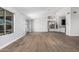 Open living area featuring vaulted ceilings, modern ceiling fan, and views of the backyard at 1343 W San Carlos Pl, Chandler, AZ 85248
