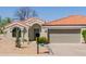 Charming single-story home with a tile roof, desert landscaping, and an inviting entrance at 14239 N Edgeworth Dr # A, Fountain Hills, AZ 85268