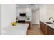 Bright kitchen with modern appliances, including a stainless steel microwave and white quartz countertops at 14239 N Edgeworth Dr # A, Fountain Hills, AZ 85268