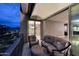 Stylish balcony with seating and sunset views, seamlessly connected to interior living space at 15215 N Kierland Blvd # 636, Scottsdale, AZ 85254
