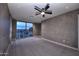 Expansive bedroom with large windows offering beautiful views of the cityscape at 15215 N Kierland Blvd # 636, Scottsdale, AZ 85254
