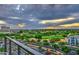 View of lush golf course from balcony with beautiful sunset views, manicured grounds, and green fairways at 15215 N Kierland Blvd # 636, Scottsdale, AZ 85254
