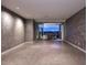Spacious living room with floor-to-ceiling balcony doors offering scenic views and ample natural light at 15215 N Kierland Blvd # 636, Scottsdale, AZ 85254