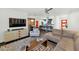 Inviting living area with stylish furnishings and open floor plan leading to the kitchen at 1617 W Lamar Rd, Phoenix, AZ 85015