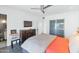 Comfortable main bedroom with a television, closet, and neutral color scheme at 1617 W Lamar Rd, Phoenix, AZ 85015