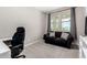 Cozy office with sofa, desk, and natural light at 17171 W Tonto St, Goodyear, AZ 85338
