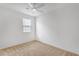 Neutral bedroom with carpet, a window offering lots of light, and plenty of space at 1727 E Chelsea Ln, Gilbert, AZ 85295