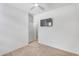 Comfortable carpeted bedroom with ceiling fan, and convenient closet access at 1727 E Chelsea Ln, Gilbert, AZ 85295